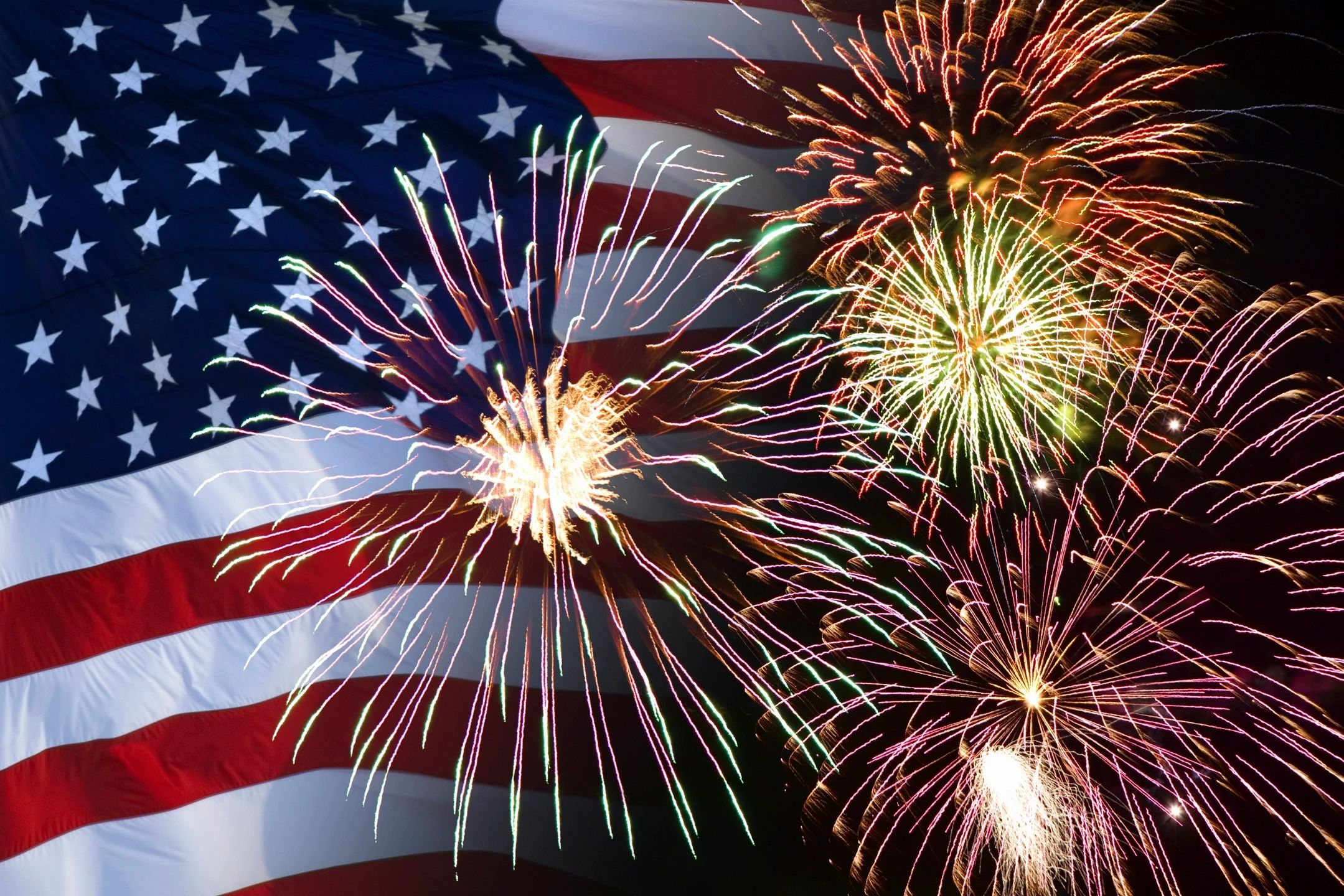 fireworks in front of an american flag