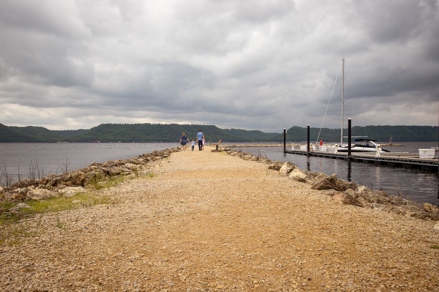A family walks along lake pepin