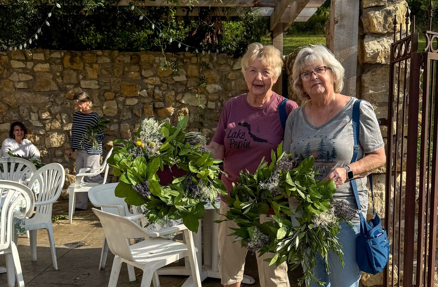 Two women at a wreath making event at Lavender Bluff Farm